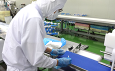 Taking a swab test from a conveyor belt